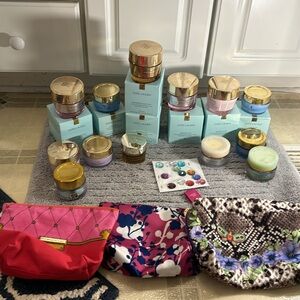 Empty Estée Lauder moisturizer jars with boxe and cover slips